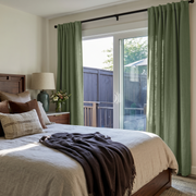 Asparagus Green Linen Back Tab Curtains for Sliding Door in a Cozy Bedroom with Cream Walls and Warm Wood Furniture - Cotton Lining