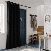 Black Thermal Door Curtain in a Hallway with White Walls and a Blue Door