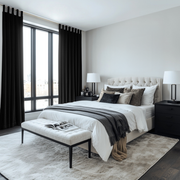 Black Velvet Tab Top Blackout Curtains in a Bedroom with Light Grey Walls