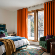 Burnt Orange Linen Grommet Curtains in a Colorful Bedroom with Soft White Walls  and a Snowy Forest View - Blackout Lining
