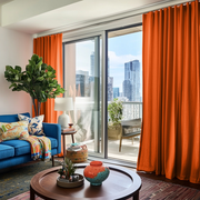 Burnt Orange Linen S-Fold Curtains for Bifold Doors in a Living Room with White Walls - Cotton Lining