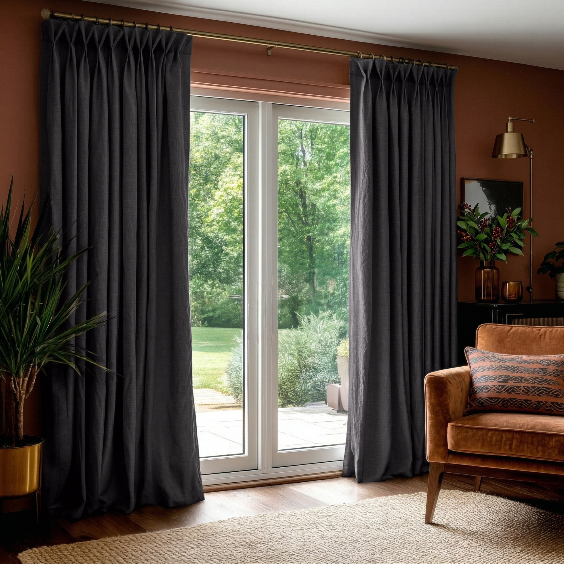 Charcoal Grey Linen Pinch Pleat Curtains for Bifold Doors in a Living Room with Terracotta Walls - Blackout Lining