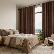 Chocolate Brown Velvet Eyelet Blackout Curtains in a Bedroom with Off-White Walls