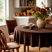 Chocolate Brown Velvet Round Tablecloth in a Cozy Dining Room with Soft Cream Walls