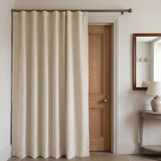 Thermal Door Curtains in a Hallway with Neutral Off-White Walls and a Natural Wooden Door