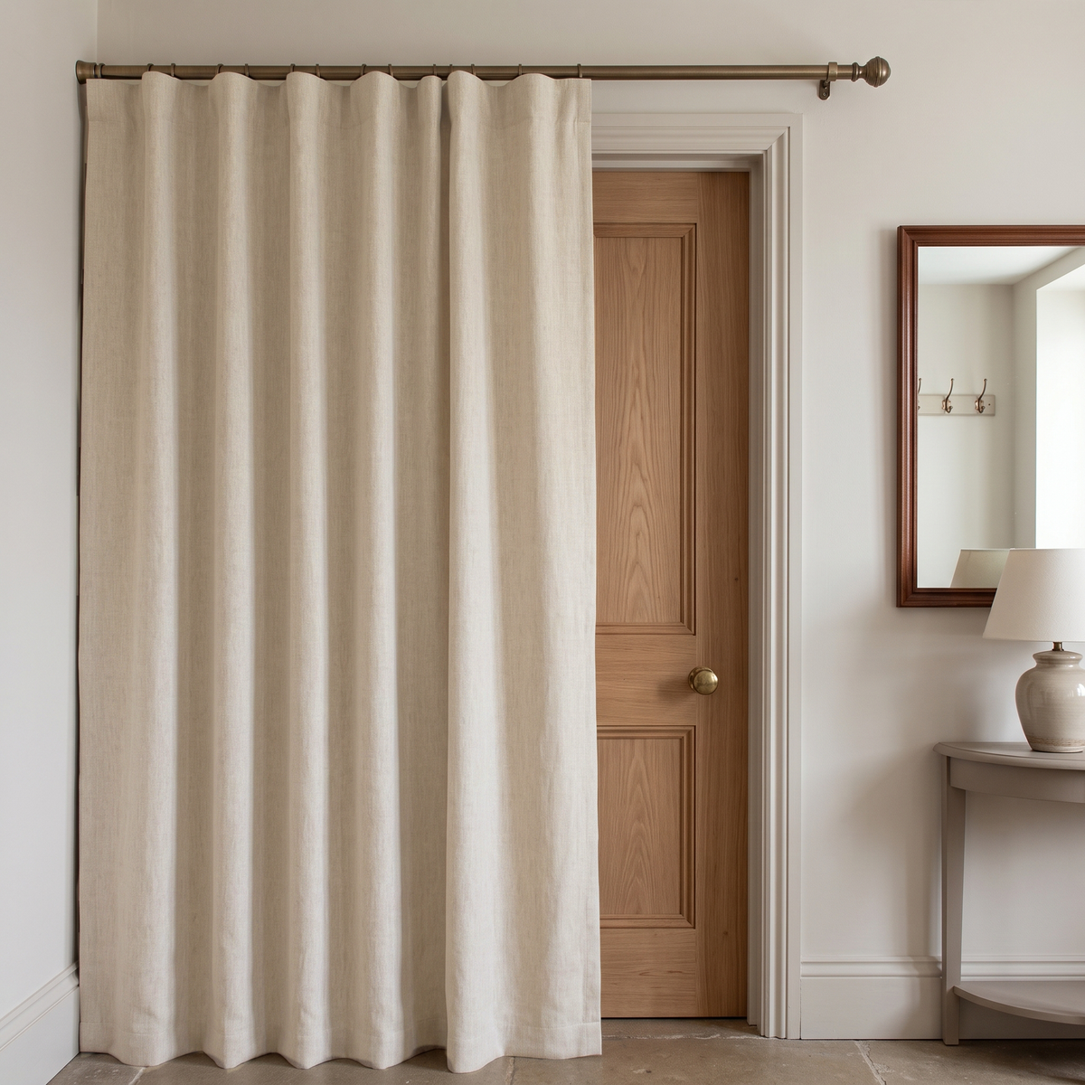Thermal Door Curtains in a Hallway with Neutral Off-White Walls and a Natural Wooden Door