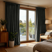Dark Grey Velvet Pinch Pleat Sliding Patio Door Curtains in a Warm Modern Bedroom with Wood Furniture