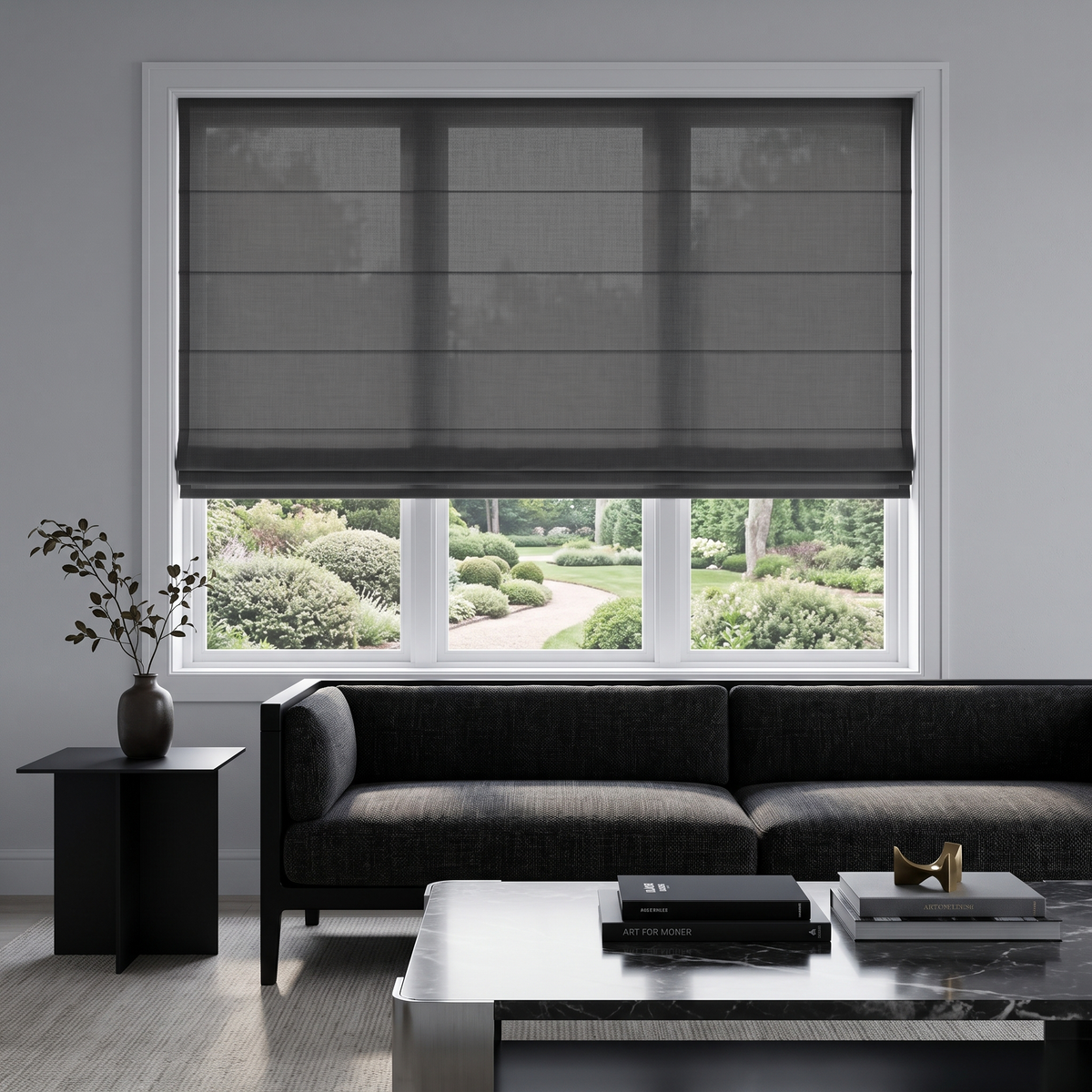 Dim Grey Roman Blinds in a Modern Living Room with Pale Grey Walls and a Charcoal Sofa