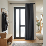 Thermal Door Curtains in a Hallway with Off-White Walls and a Dark Grey Door
