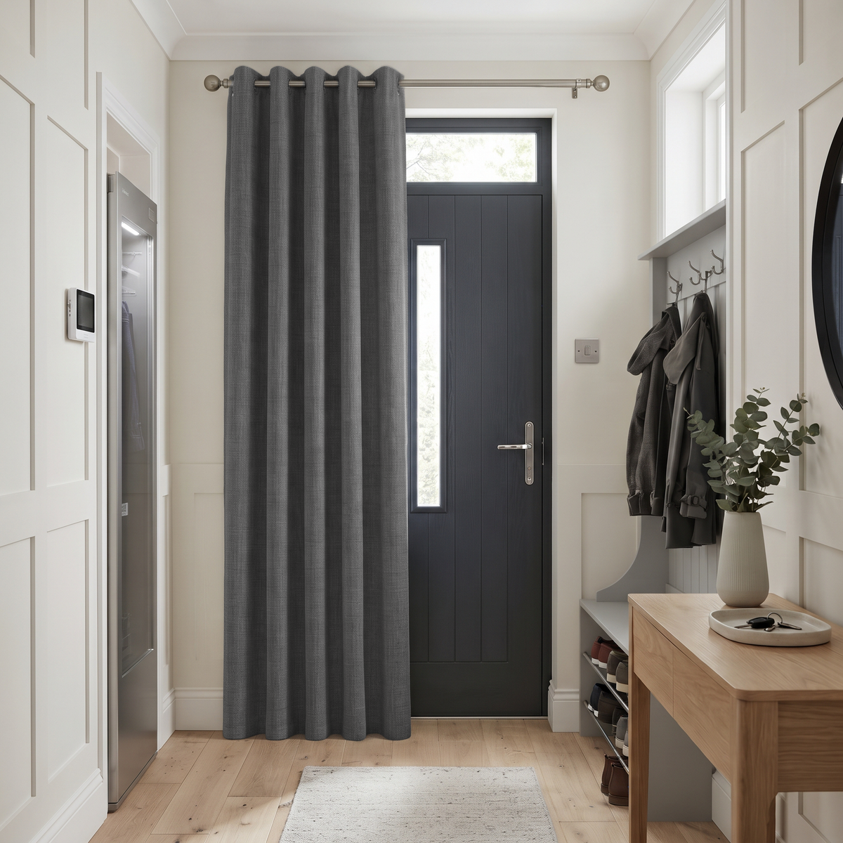 Thermal Door Curtains in a Hallway with White Paneled Walls and a Dark Grey Door