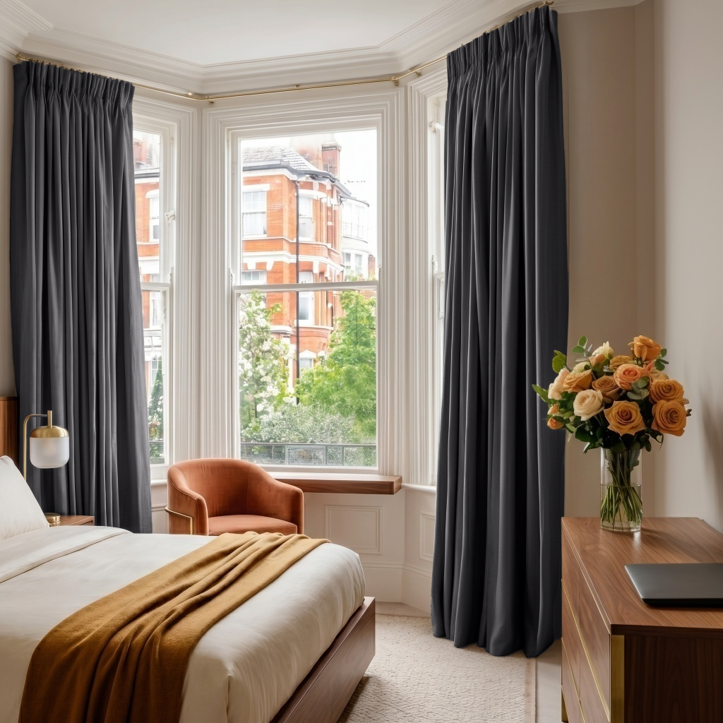 Dim Grey Linen Pencil Pleat Curtains in a Bright White Bedroom with Warm Leather Accents - Blackout Lining