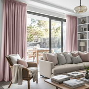 Dusty Pink Linen Pencil Pleat Curtains for Bifold Doors in a Living Room with Bright White Walls - Cotton Lining