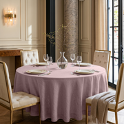 Dusty Pink Linen Round Tablecloth in an Elegant Dining Room with Cream Paneled Walls and Marble Accents