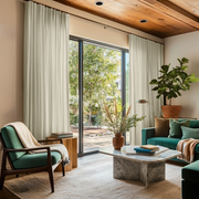 Ecru Heavy Weight Linen S-Fold Curtains for Sliding Door in a Modern Living Room with Wood Ceiling and Green Accent Seating