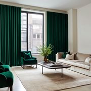 Emerald Green Velvet S-Fold Blackout Curtains in a Living Room with Off-White Walls