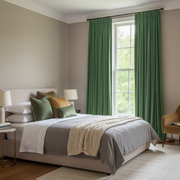 Fern Green Velvet Pencil Pleat Blackout Curtains in a Bedroom with Grey Walls