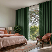 Forest Green Linen Eyelet Bedroom Curtains in a Bright Contemporary Bedroom with Blush Pink Bedding, a Sculptural Wood Lounge Chair, and Terracotta Accents - Cotton Lining