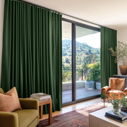 Forest Green Linen S-Fold Curtains for Bifold Doors in a Living Room with Warm White Walls - Cotton Lining