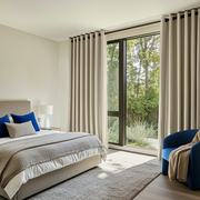 Ecru Heavy Weight Linen Eyelet Curtains in a Bright Bedroom With Blue Accents - Blackout Lining