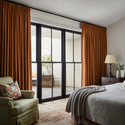 Terracotta Linen Pencil Pleat Curtains in a Modern Bedroom with Warm Earth Tones - Blackout Lining