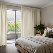 Ecru Heavy Weight Linen Pencil Pleat Bedroom Curtains in a Calm Neutral Bedroom with Taupe Walls and Olive Green Accents
