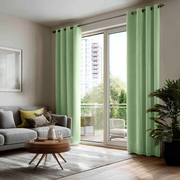 Lime Green Velvet Grommet Blackout Curtains for Sliding Doors in a Living Room with Off-White Walls