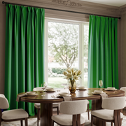 Bright green pleated window curtains hanging on a black rod in a dining room setting with a wooden dining table and chairs.