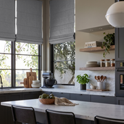 Stone Grey Linen Roman Blinds in a Modern Kitchen with Marble Counters - Blackout Lining