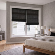 Black Roman Blinds in a modern bedroom with grey-painted walls