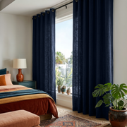 Royal Blue Linen Eyelet Curtains in a Warm Bedroom with Soft White Walls