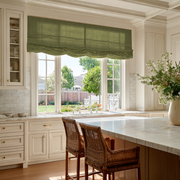 Olive Green Linen Relaxed Roman Blinds in an Elegant Kitchen with Cream Cabinetry