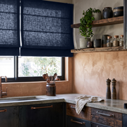 Royal Blue Linen Kitchen Roman Blinds in a Rustic Kitchen with Plaster Walls