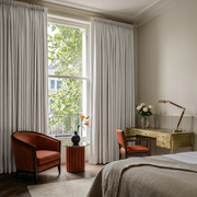 Off-White Linen Pencil Pleat Curtains in an Elegant Classic Bedroom with Warm Neutrals, Brass Accents - Blackout Lining