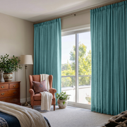 Aquamarine Blue Linen Pencil Pleat Curtains in a Light Neutral Bedroom - Cotton Lining