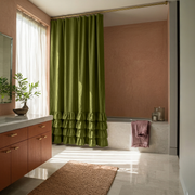 Moss Green Linen Ruffle Shower Curtain in a Warm Contemporary Bathroom with Blush Plaster Walls