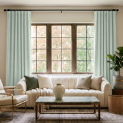 Mint Green Velvet Multitape Soundproof Curtains in a Contemporary Living Room with Beige Walls and White Seating
