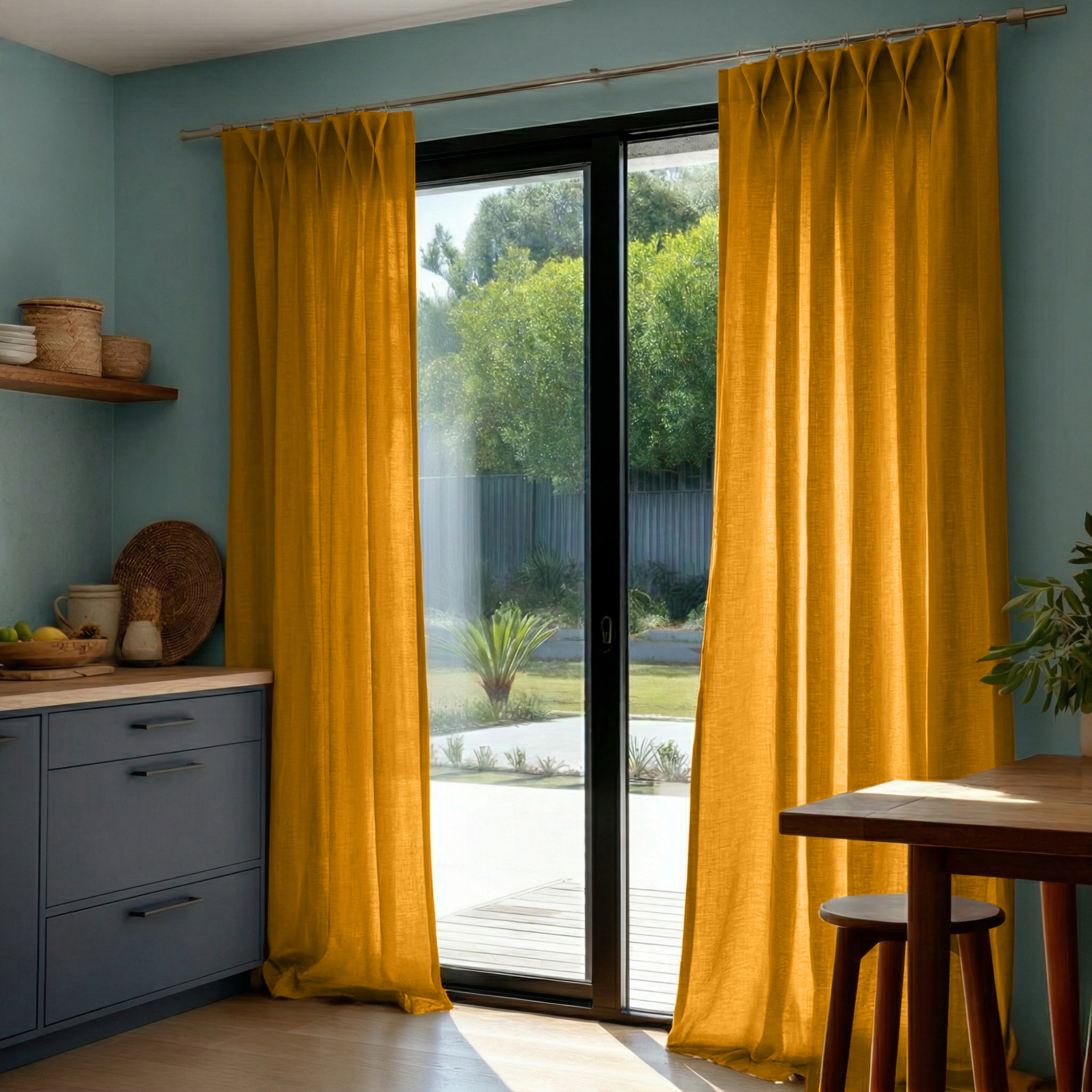 Mustard Yellow Linen Pinch Pleat Curtains for Bifold Doors in a Kitchen with Blue Walls
