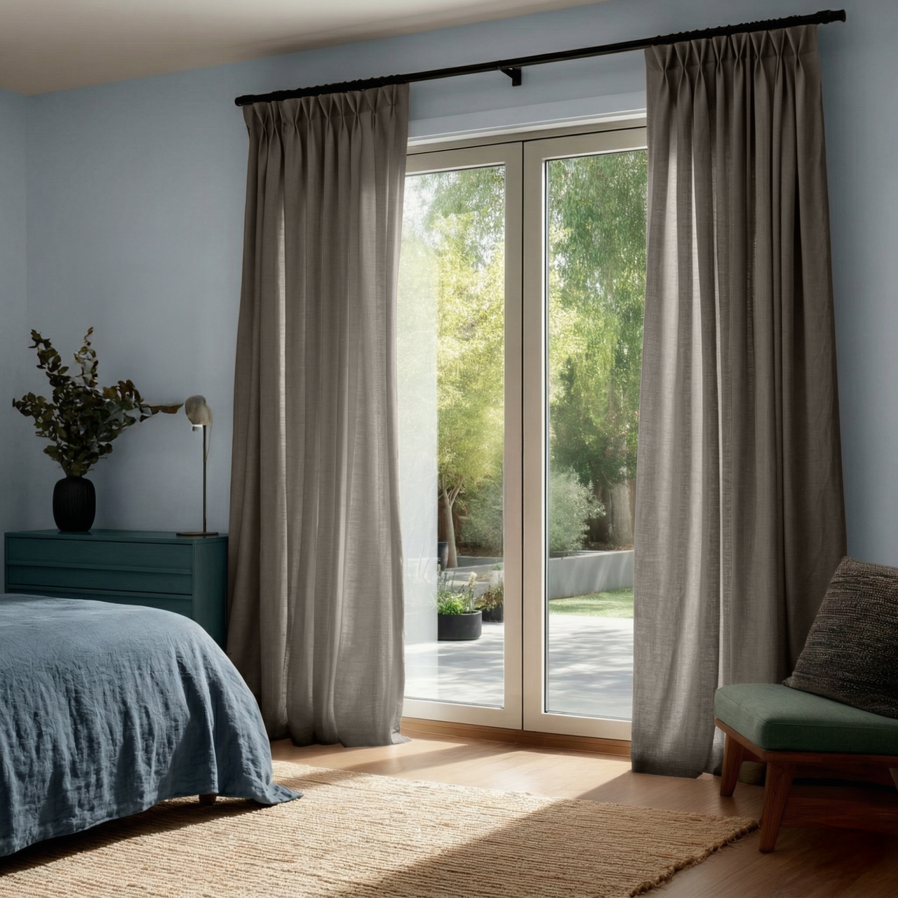 Natural Heavy Weight Linen Pinch Pleat Curtains for Sliding Door in a Calm Bedroom with Blue Walls and Teal Furniture