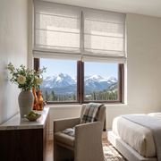 Natural Roman Blinds in a Contemporary Bedroom