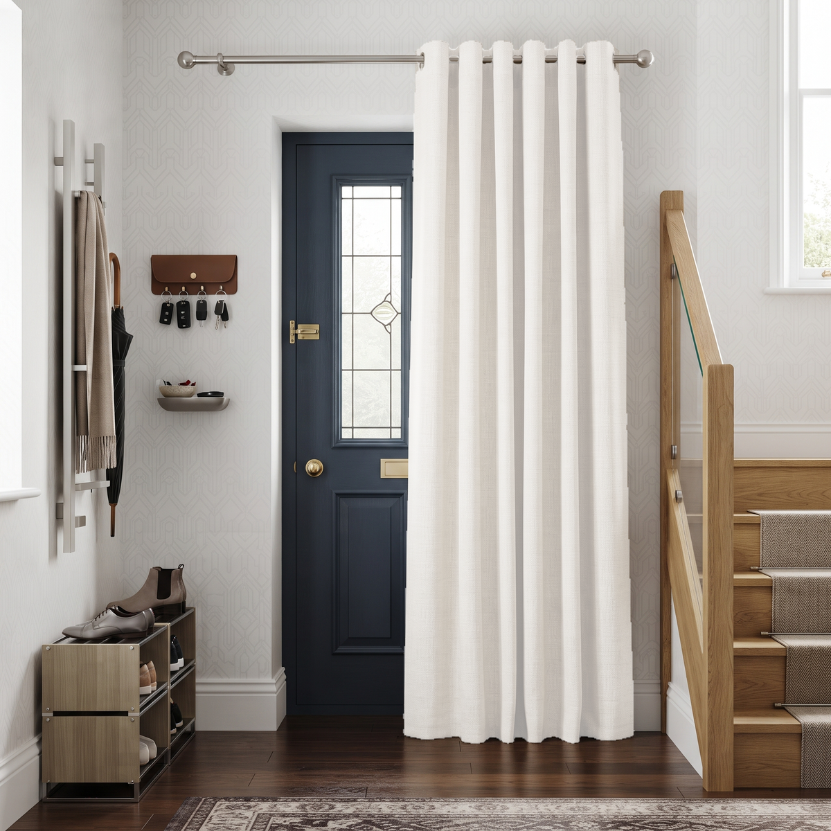 Off-White Heavy Weight Thermal Door Curtain in a Hallway with Light Gray Geometric Wallpaper and a Dark Blue Front Door