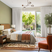 Off-White Heavy Weight Linen Pencil Pleat Curtains for Sliding Doors in a Bedroom with Sage Green Walls