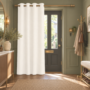 Thermal Door Curtains in a Hallway with Sage Green Walls and a Wooden Console Table