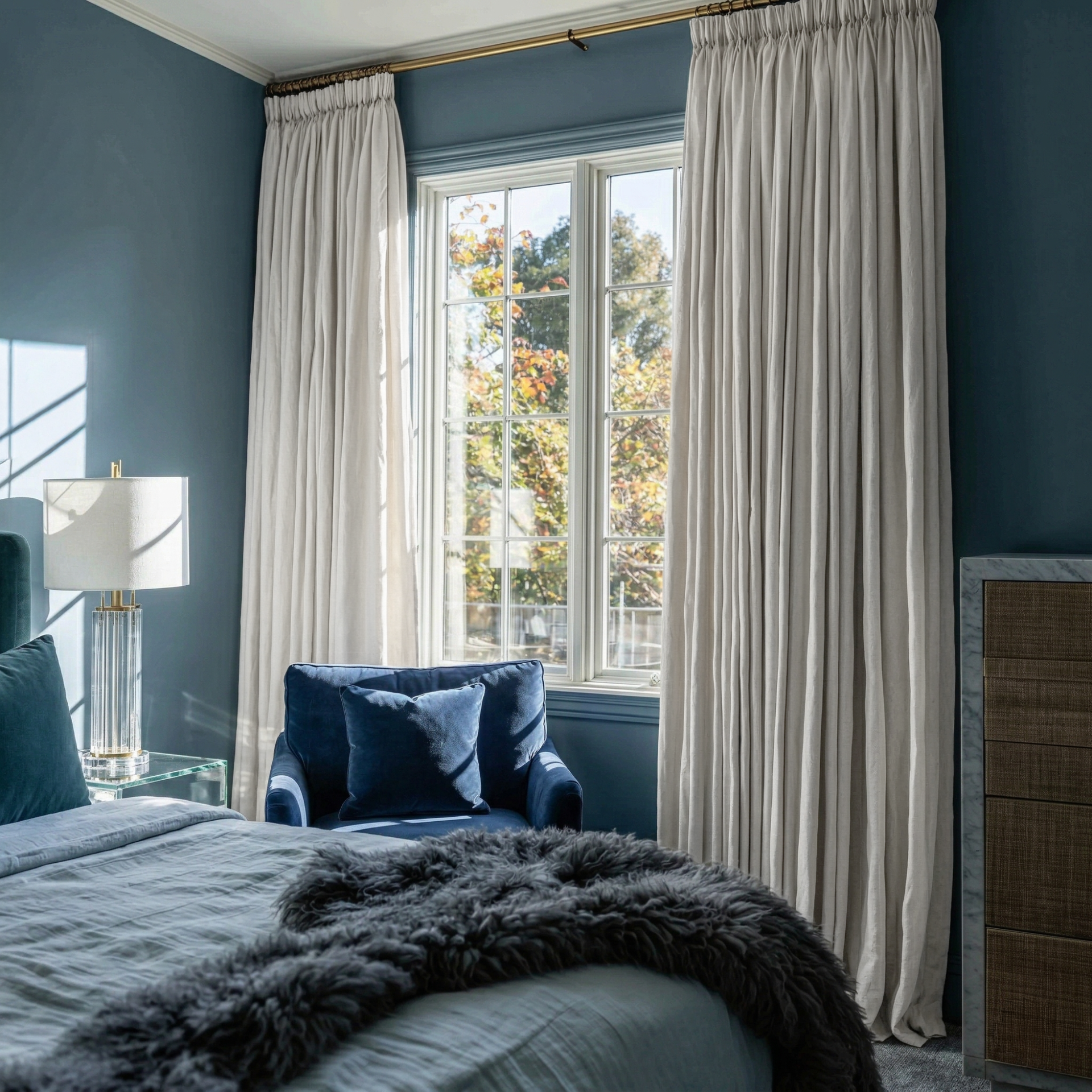 Off-White Linen Pencil Pleat Curtains in a Sophisticated Blue Accent Bedroom with Plush Fabrics - Blackout Lining