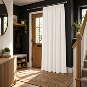 Thermal Door Curtains in a Hallway with a Dark Wood Door