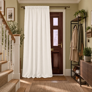 Thermal Door Curtains in a Hallway with Sage Green Walls and a Wooden Coat Stand