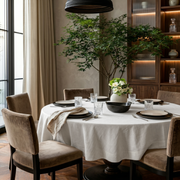 Off-White Linen Round Tablecloth in an Elegant Dining Room with Walnut Cabinetry