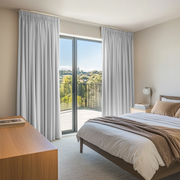 Off-White Velvet Pencil Pleat Blackout Curtains for Bifold Doors in a Bedroom with Beige Walls
@Heading: Pencil Pleat