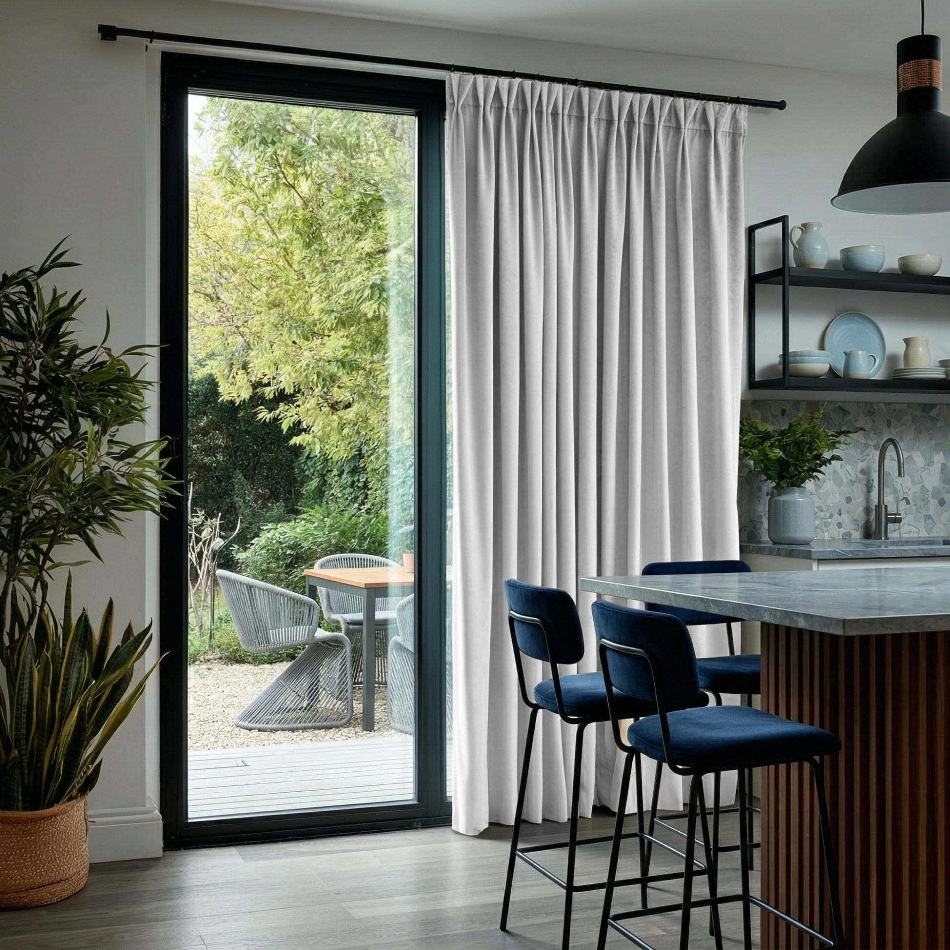 Off-White Velvet Pinch Pleat Blackout Curtains for Sliding Doors in a Kitchen with Grey Walls