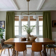 Olive Green Linen Rod Pocket Curtains in a Transitional Dining Room with a Wooden Table