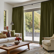Olive Green Velvet Pencil Pleat Blackout Curtains for Sliding Doors in a Living Room with Light Grey Walls